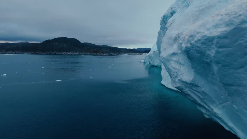 Melting glacier and ice floating on the water along the arctic coast