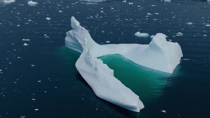 Melting iceberg and floating ice on arctic water