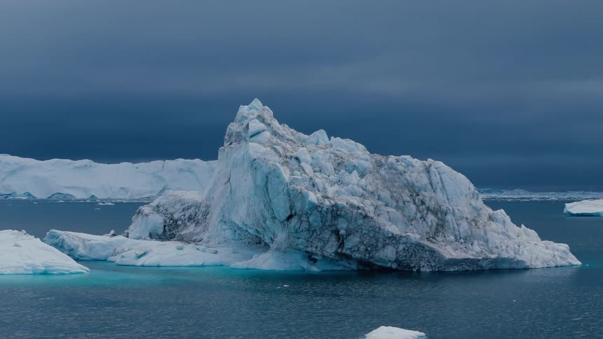 Melting iceberg and floating ice on arctic water