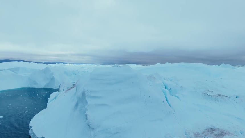 Icebergs and melting ice floating on arctic water