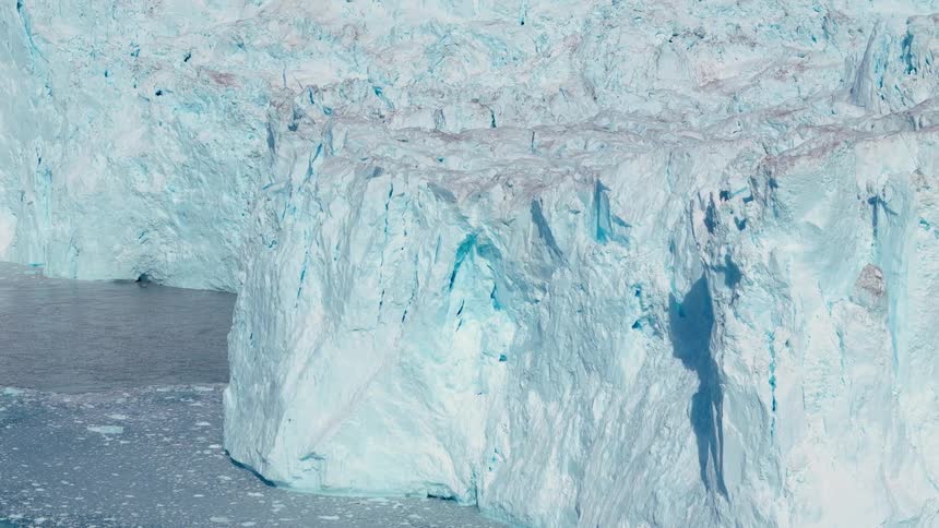 Glaciers and icebergs with melting ice in the arctic