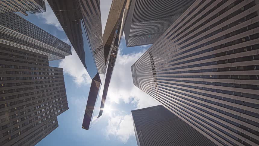 View looking up at tall buildings and skyscrapers