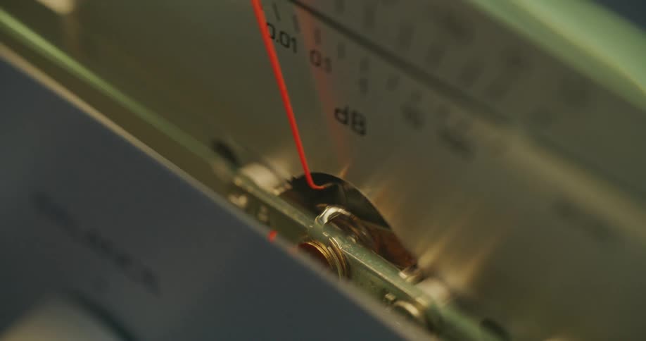 The dial on the radio bumps up