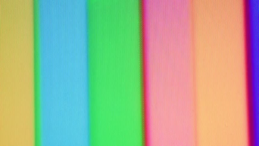 The video displays a fullscreen static test pattern commonly seen on older analog televisionsthe pattern consists of vertical bars of bright solid colors including yellow cyan green magenta red and blue