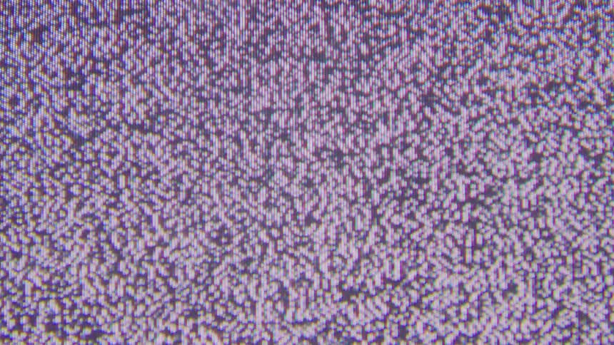 The black and white static flickers on the screen
