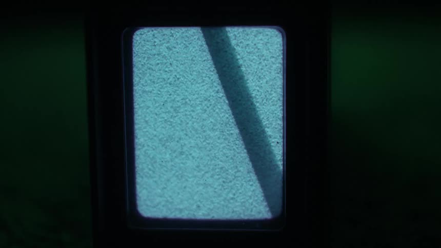 An electric screen has static and a line moving across it