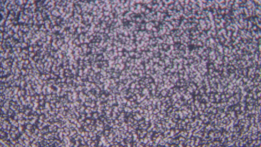 The video is a closeup of a television screen showing extreme video signal interferenceit features various types of visual noise including colored diagonal bands red and blue digital static and finegrain black and white snow that complet