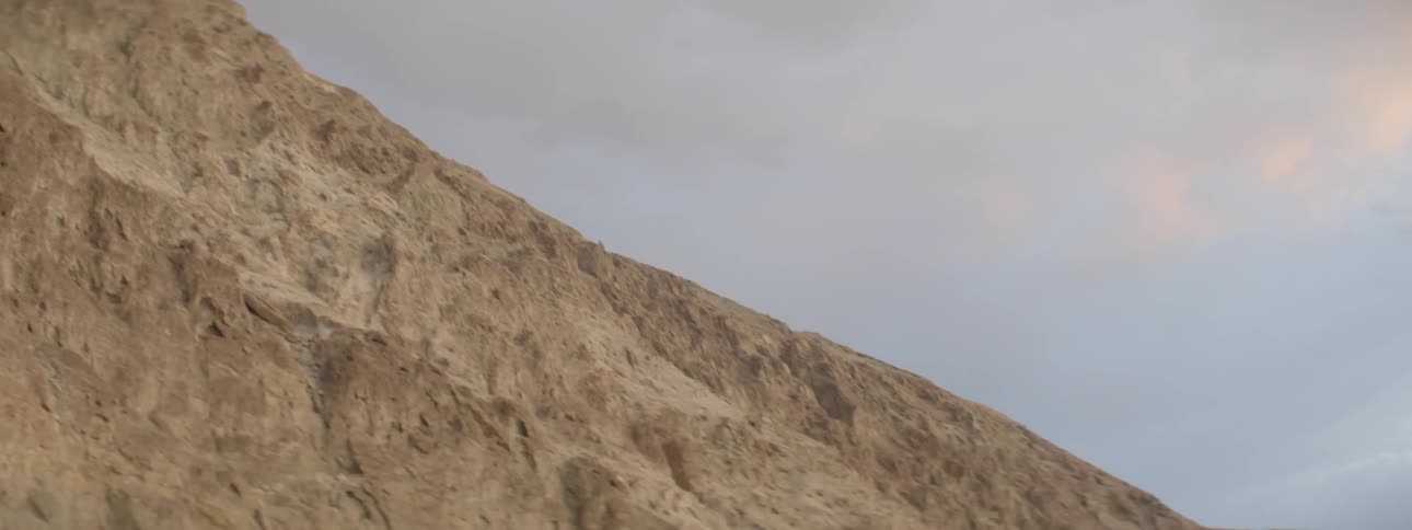The hillside is brown with soil
