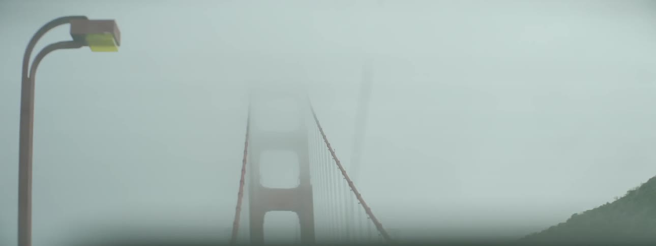 Heavy fog is covering this bridge