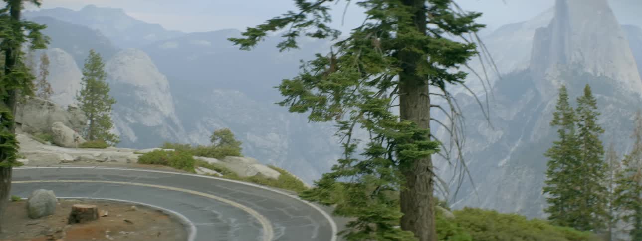 A road curves in the mountains