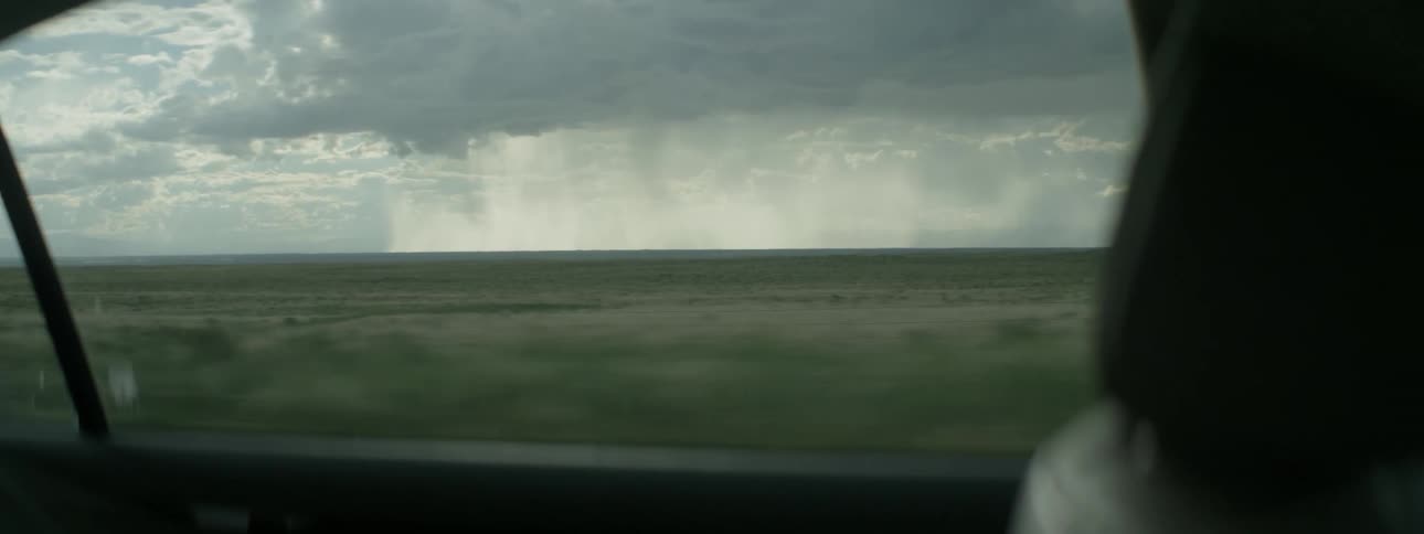 View looking out of a car window on a cloudy day