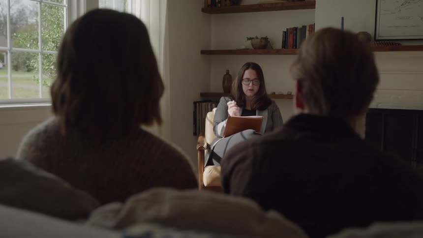 The psychiatrist is talking to a couple
