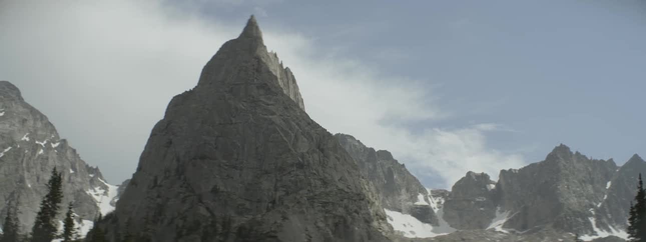 The mountain has a jagged tip at the top