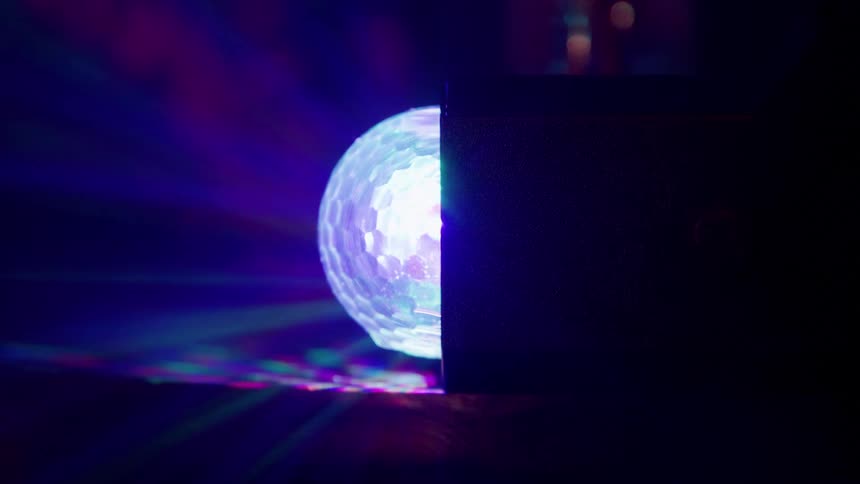 The orb glows and flashes colors