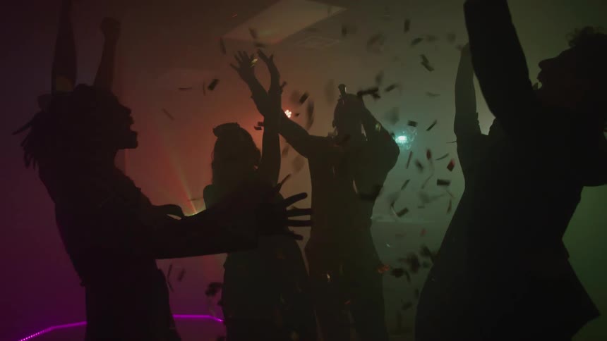 Group of friends celebrating a birthday countdown at a party