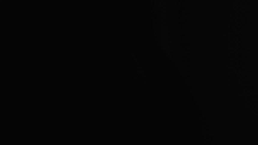 In this video a man is practicing his boxing moves and the light is flickering continuously