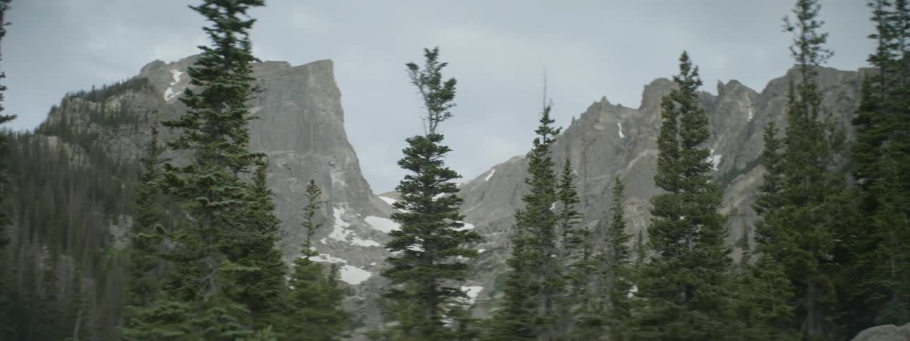Patches of snow on tall mountains