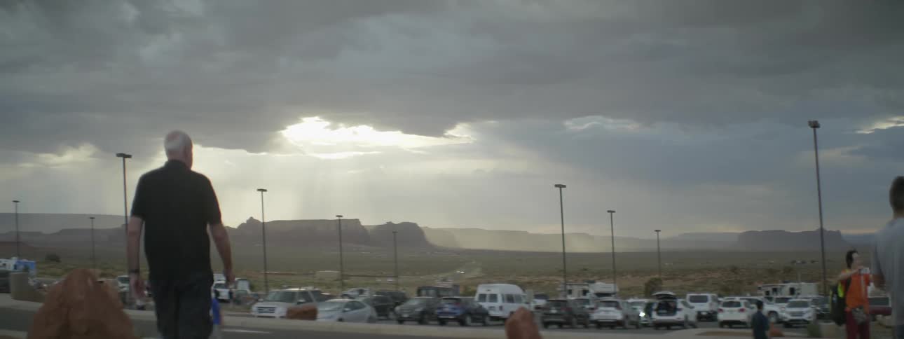 Cars are parked in a parking lot