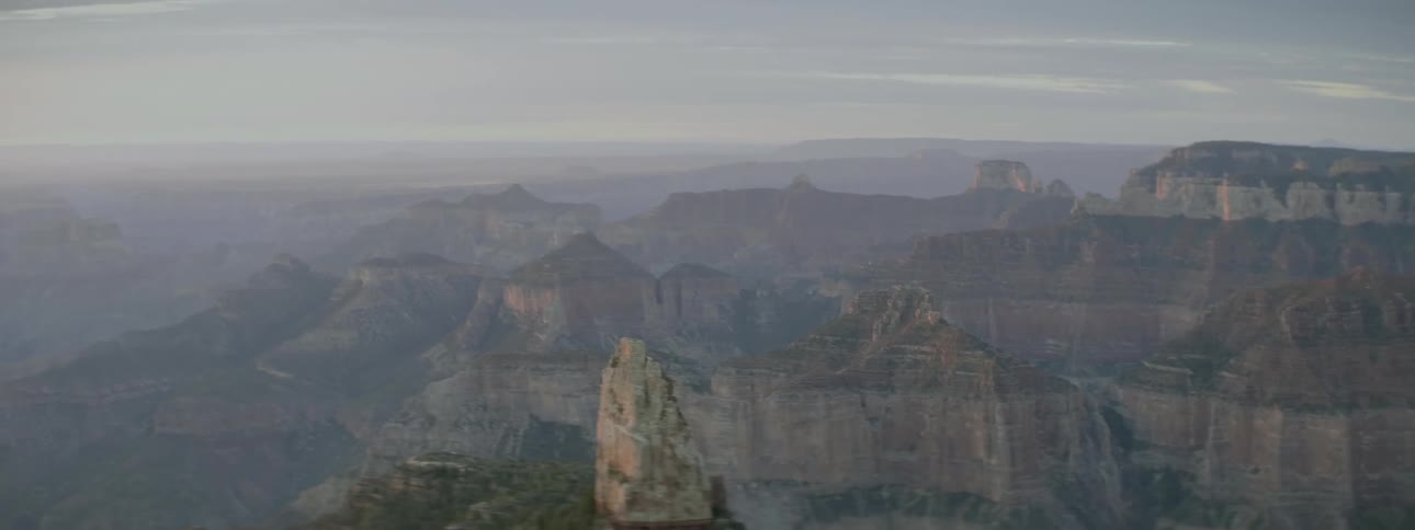 A mountain range ahead has many cliffs