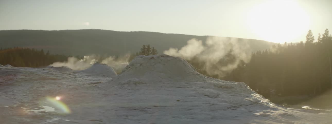 Steam rises from the rocks on this cliff
