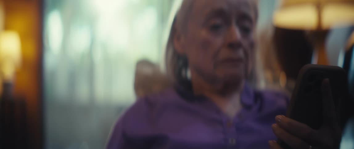 A woman uses her phone