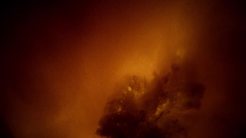 Bubbling appearance against amber background