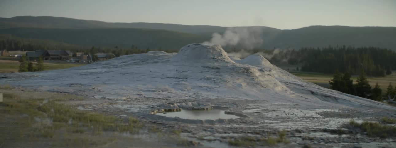 Steam slowly rises from the ground