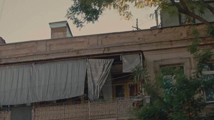 The buildings have balconies in town