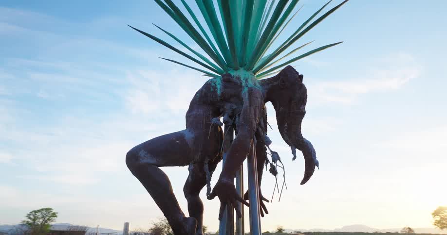 The scary sculpture is on a pole high up