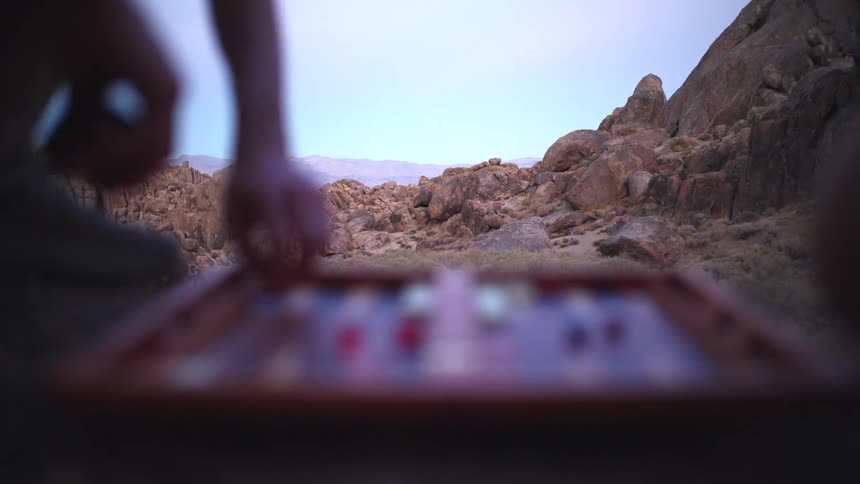 People are playing backgammon in the canyon