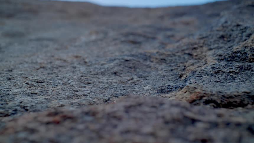A rough rocky formation at midday