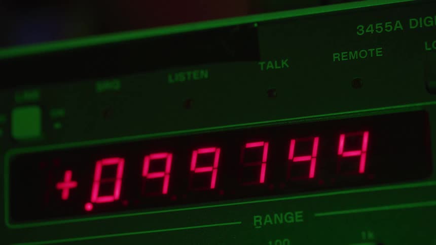 A digital device displays strings of numbers