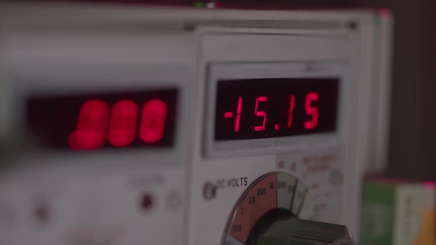 The numbers on the voltage tester rise