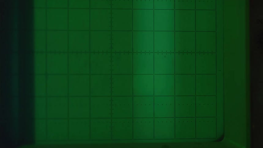 Light flashes on the grid on a scientific device