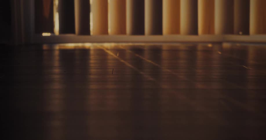 The blinds open into a room