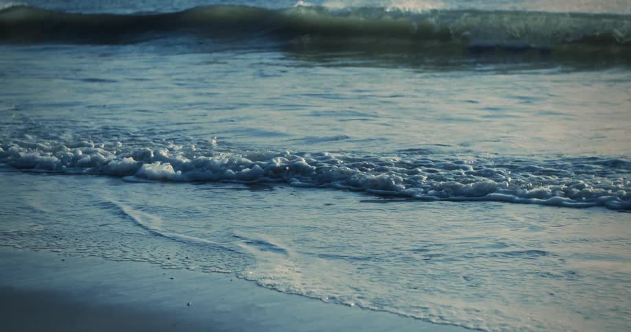 The waves travel over the shoreline