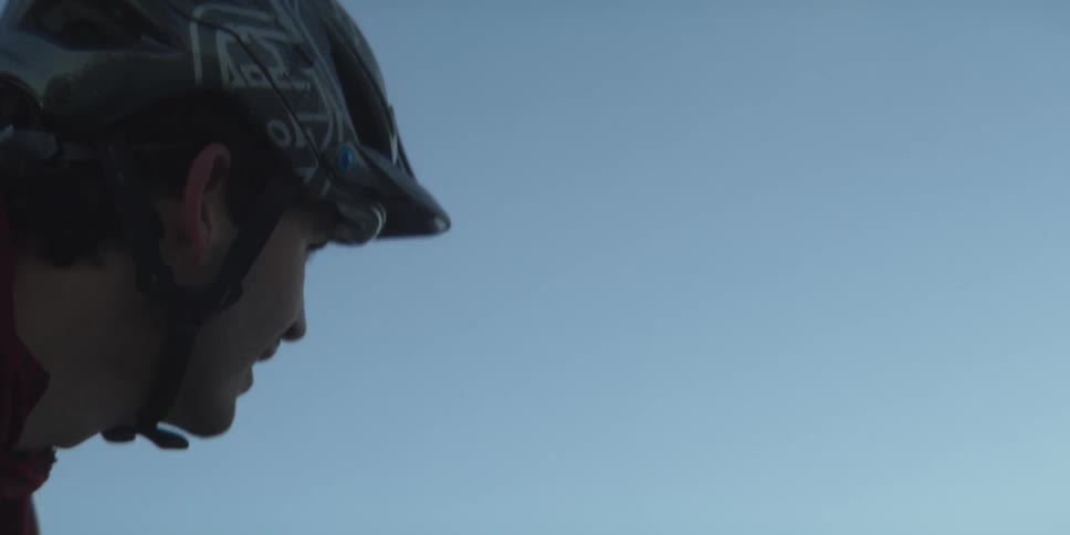 A person is moving as they wear a helmet