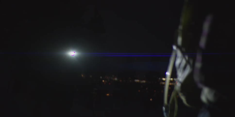 People hike on the mountain at night