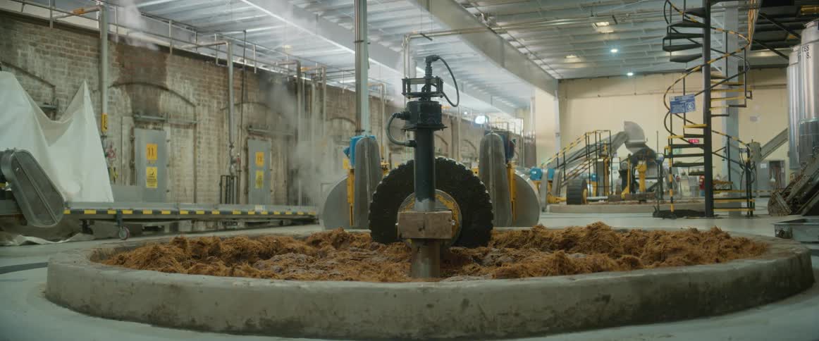 People are working in the large brewery
