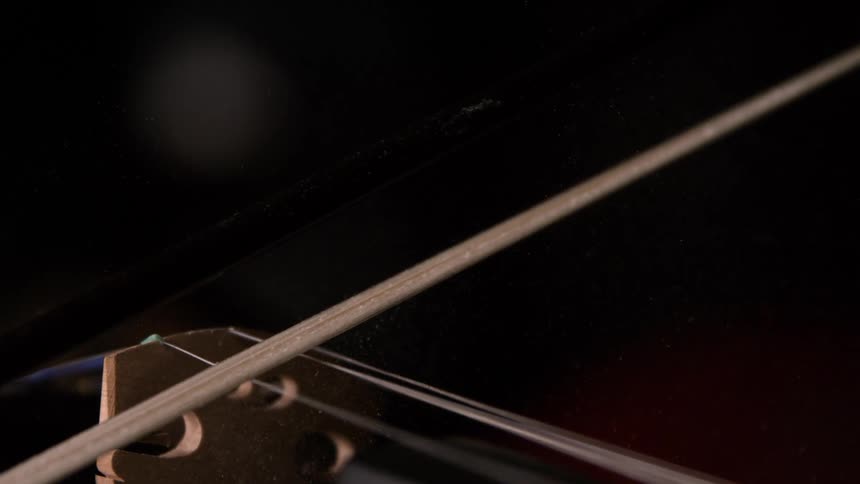 The violin is being slowly played