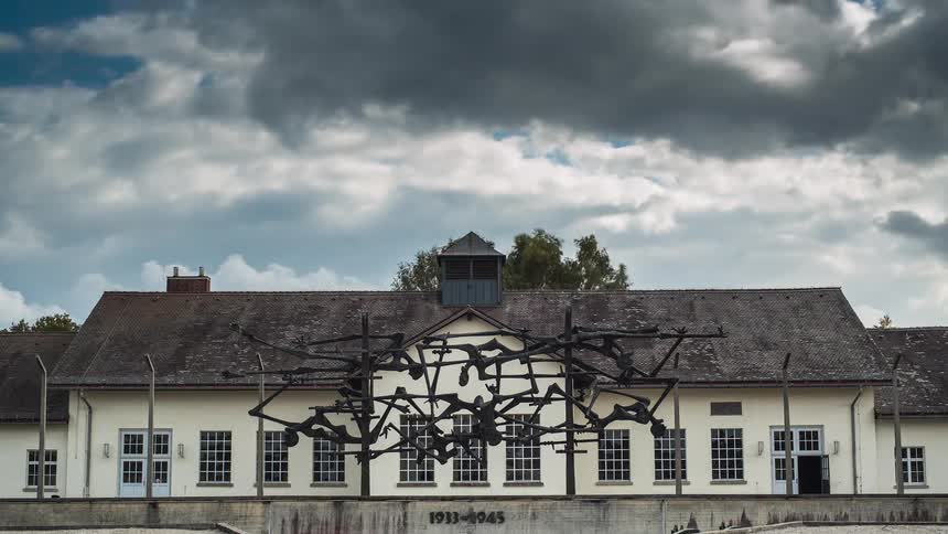 A time lapse of clouds over a building
