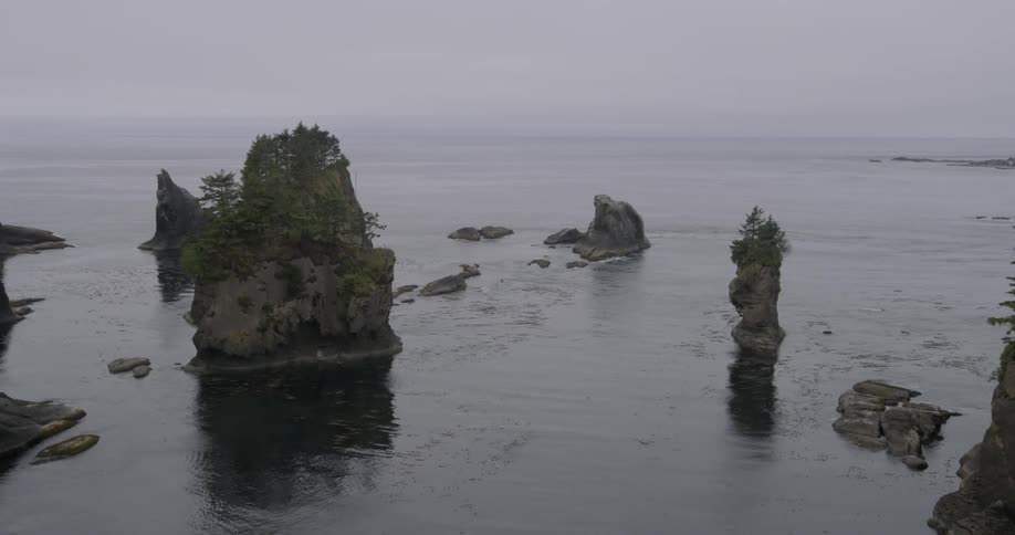 Rock formations stand in the ocean