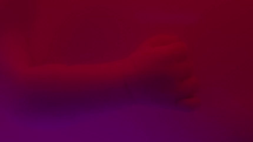This last file appears to be a solidcolored screen with a red and purple gradient and a subtle filmsupply watermark in the middle the smooth transition from deep red to purple creates an abstract lowlight or underwater mood
