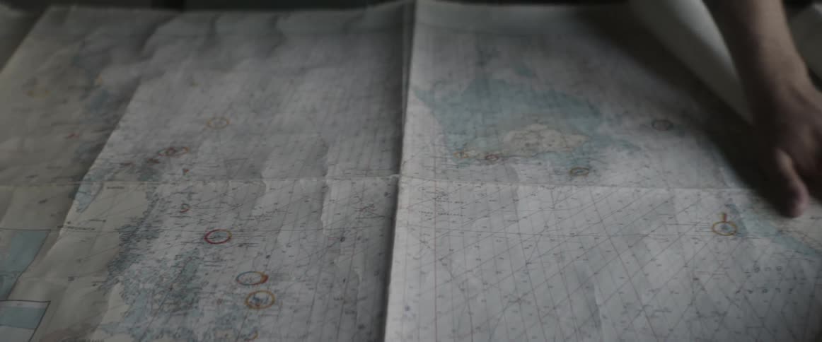 Map is unrolled on a table