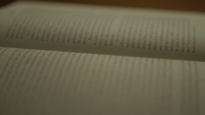A book sits on a table