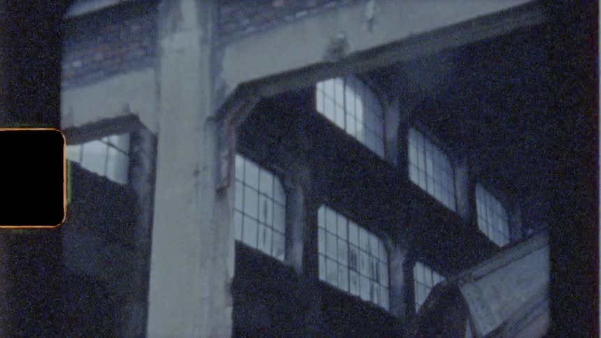 Abandoned warehouse with glass windows