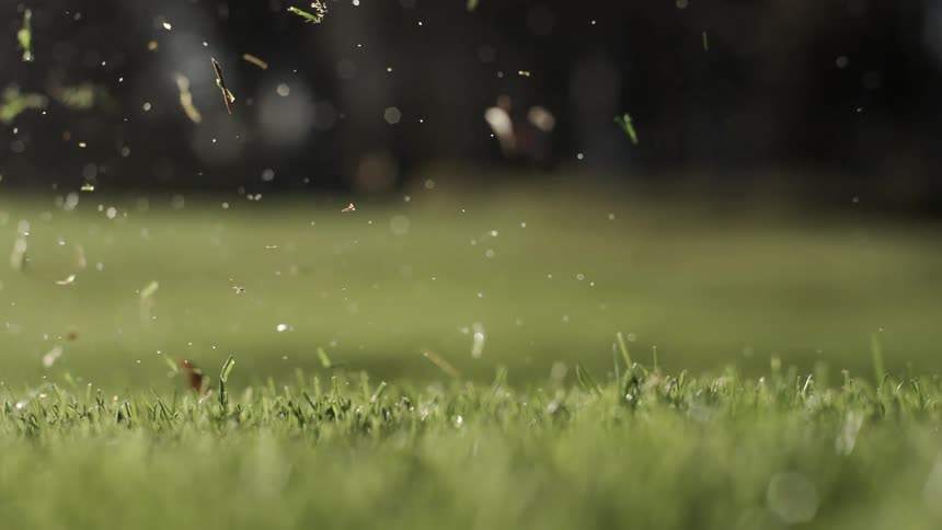 A close up view of a golf ball being hit