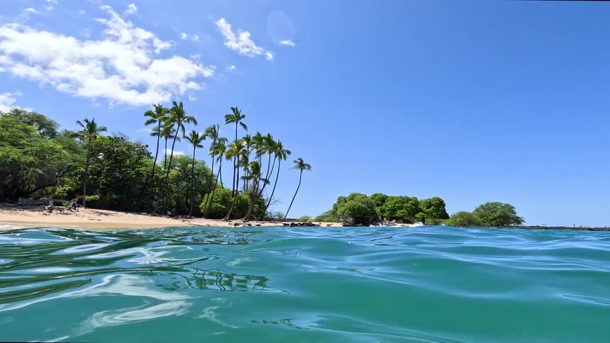 Gentle rippling water on an empty tropical beach