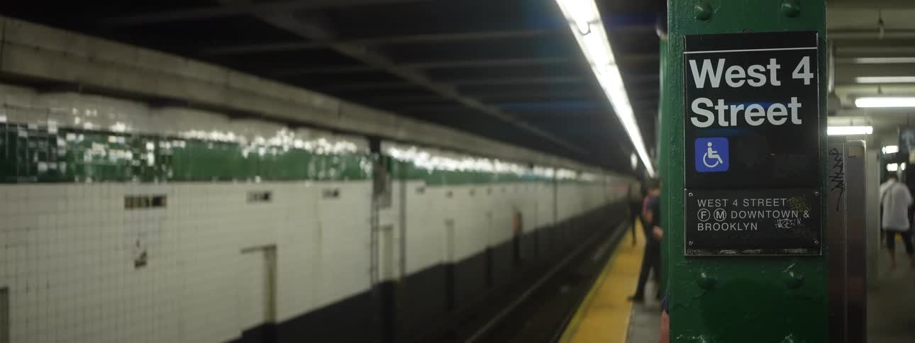 A busy subway transport terminal in a city during daytime