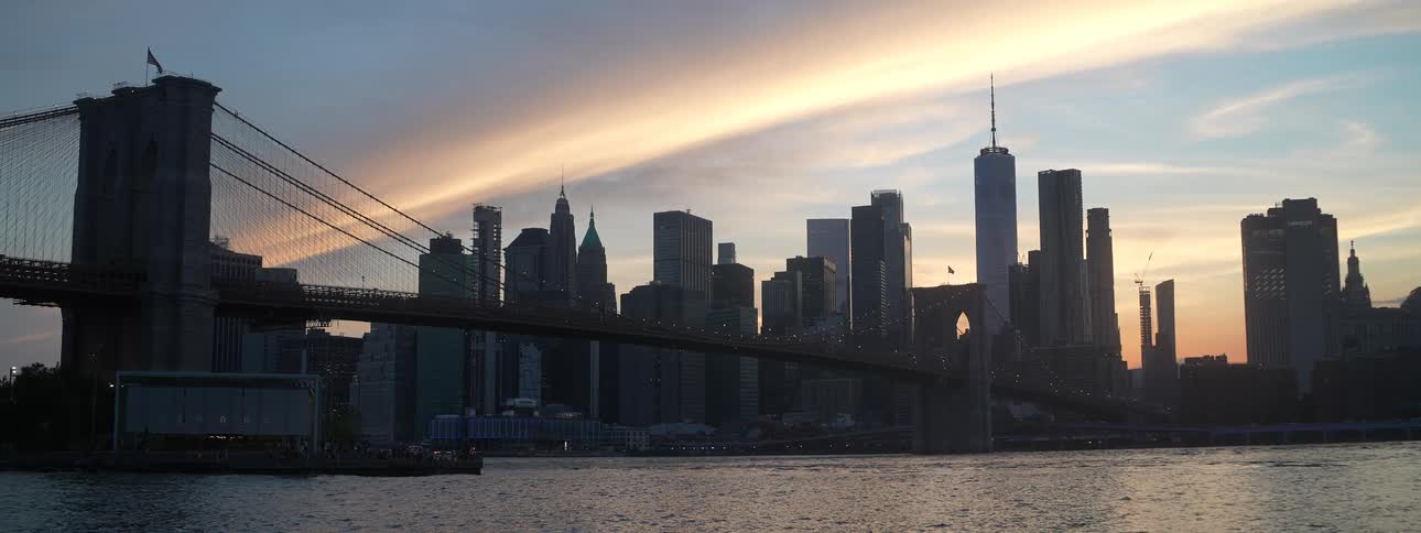 Metropolitan city skyline at sunset